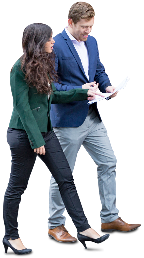 two professional business colleagues in suits walking and reviewing documents together