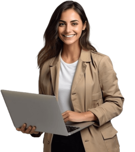 A smiling professional woman in a beige blazer and white shirt using a silver laptop.